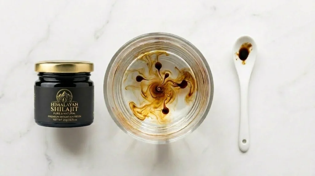 Step-by-step warm water dissolution test for liquid Shilajit — dropper adding Shilajit to warm water in a clear glass